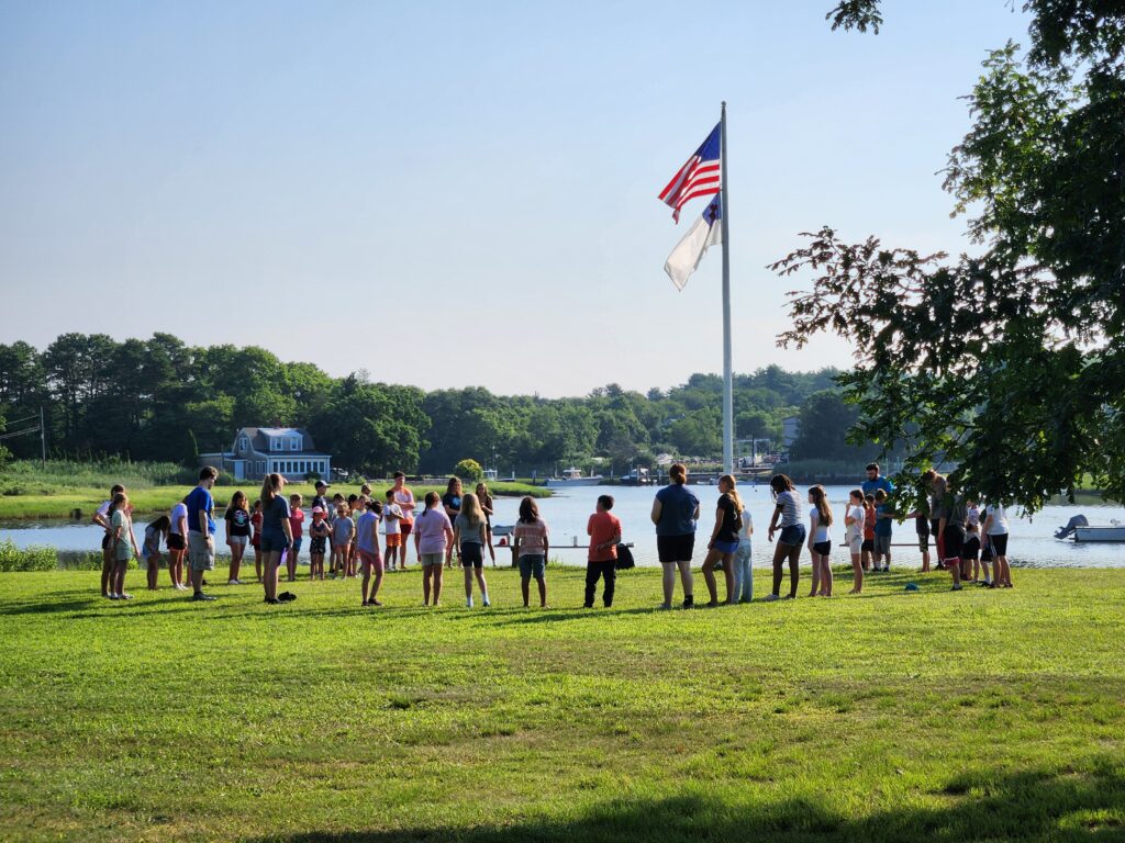 The current image has no alternative text. The file name is: Camp-at-flagpole-2024-scaled.jpg